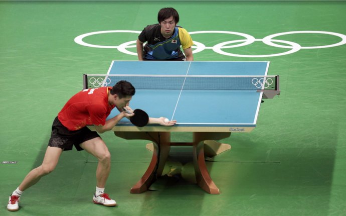 Chinese men s table tennis overcomes singles loss to win team